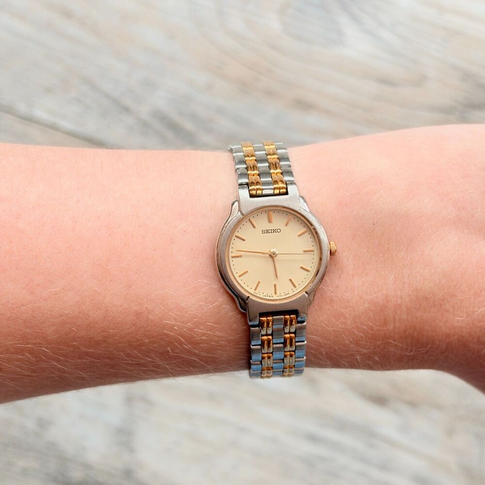 Seiko V701-2E30 Two Tone Quartz Watch Gold Silver Champagne Dial Vintage Style